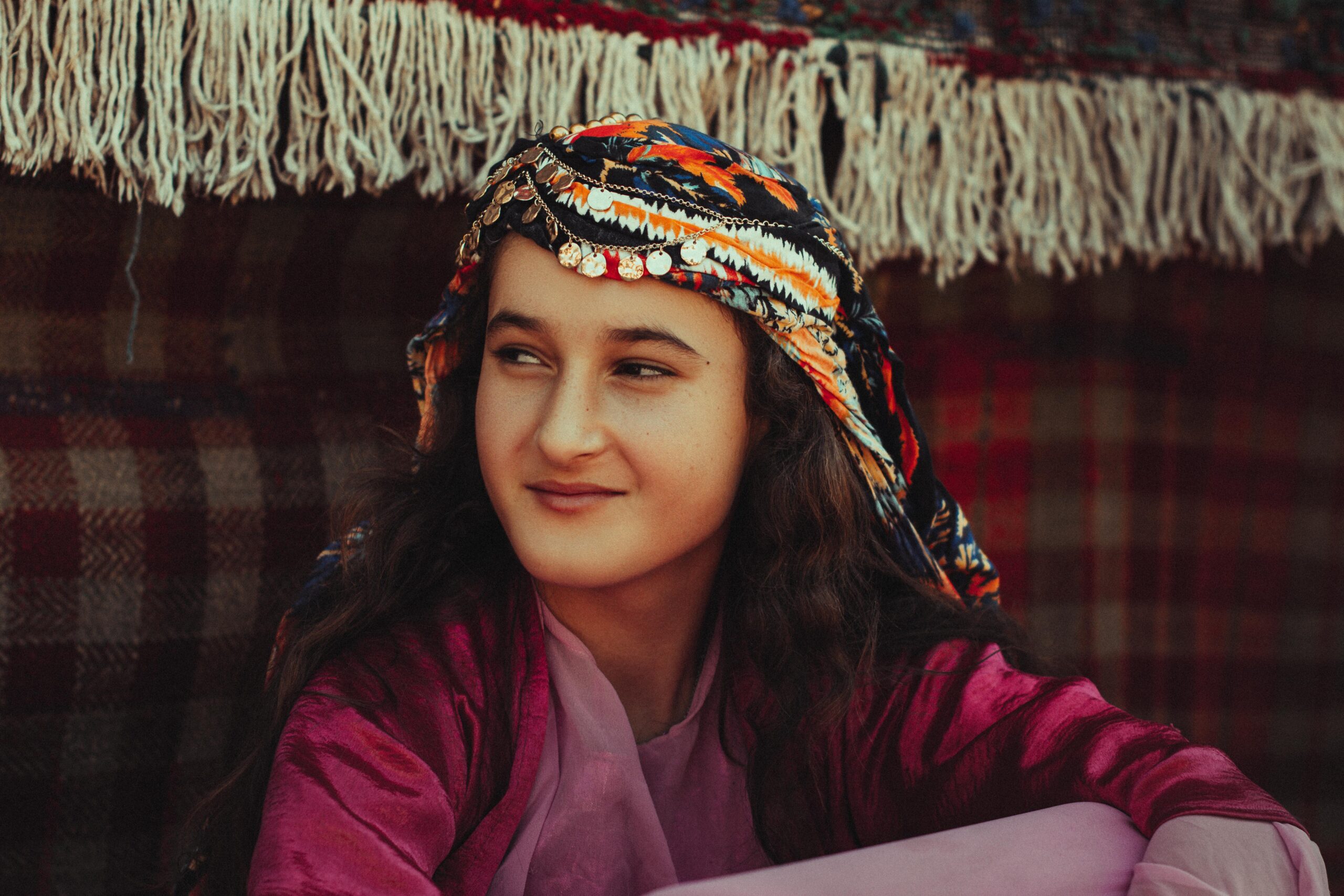 Portrait of a young woman in traditional Kurdish attire, Erbil, Iraq.